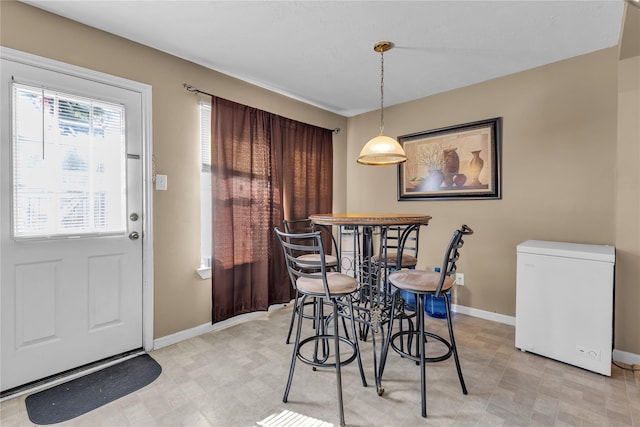 11735 Alief Clodine Rd Unit 34, Houston, TX 77072 - dining space featuring baseboards and light flooring