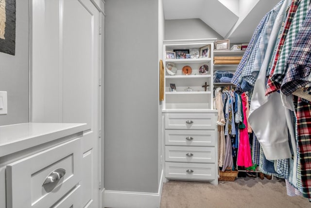 9 Broad St, Galveston, TX 77554 - walk in closet featuring light carpet and vaulted ceiling