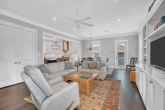 9 Broad St, Galveston, TX 77554 - living room featuring dark wood-style floors, recessed lighting, ceiling fan, a chandelier, and baseboards