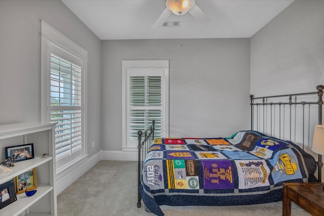 9 Broad St, Galveston, TX 77554 - bedroom with carpet flooring, a ceiling fan, and baseboards