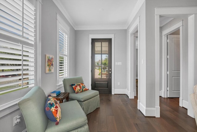 9 Broad St, Galveston, TX 77554 - living area with dark wood-style flooring, ornamental molding, and baseboards