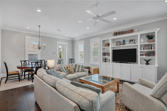 9 Broad St, Galveston, TX 77554 - living room with recessed lighting, dark wood-style floors, a chandelier, a ceiling fan, and ornamental molding