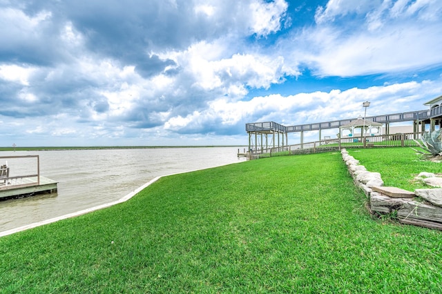 1197 County Road 230, Sargent, TX 77414 - dock area featuring a water view and a yard