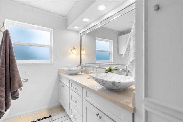 1518 S Gessner Rd, Houston, TX 77063 - bathroom with crown molding, double vanity, recessed lighting, tile patterned floors, and baseboards