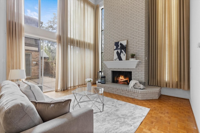 1518 S Gessner Rd, Houston, TX 77063 - living room featuring a high ceiling and a brick fireplace