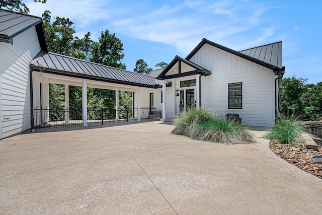 111 Seagull Path, Point Blank, TX 77364 - back of property featuring a standing seam roof and a metal roof