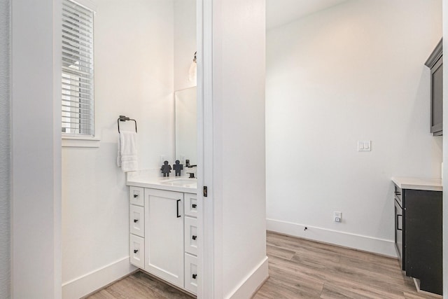 111 Seagull Path, Point Blank, TX 77364 - bathroom featuring vanity and wood finished floors