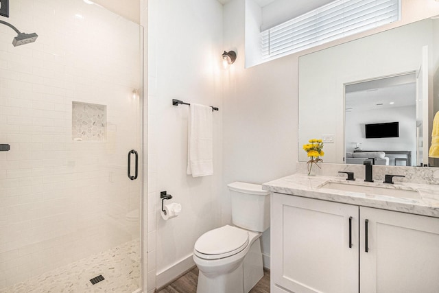 111 Seagull Path, Point Blank, TX 77364 - full bath with a shower stall, vanity, and wood finished floors