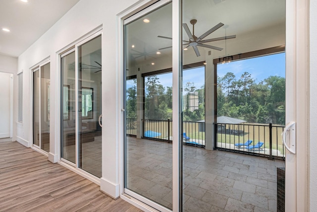 111 Seagull Path, Point Blank, TX 77364 - unfurnished sunroom with ceiling fan and plenty of natural light