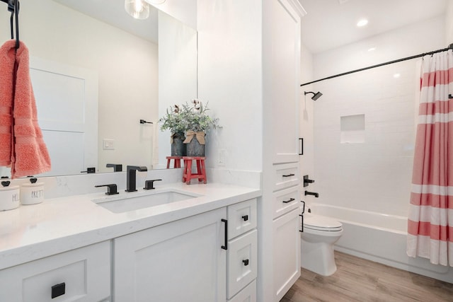 111 Seagull Path, Point Blank, TX 77364 - full bathroom featuring vanity, wood finished floors, shower / tub combo, and recessed lighting