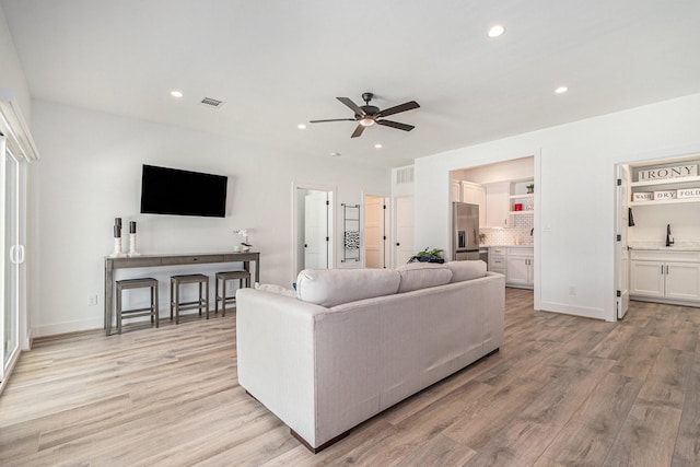 111 Seagull Path, Point Blank, TX 77364 - living area with ceiling fan, light wood-style flooring, and recessed lighting