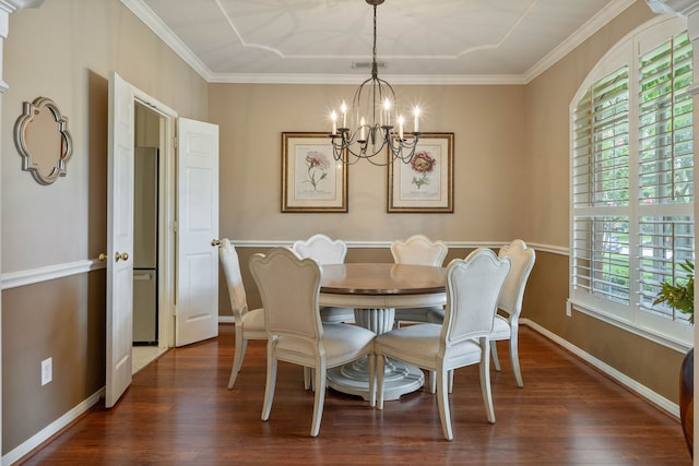 31335 Bearing Star Ln, Tomball, TX 77375 - dining space with a chandelier, plenty of natural light, wood finished floors, and crown molding