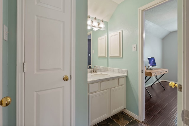 31335 Bearing Star Ln, Tomball, TX 77375 - bathroom featuring vaulted ceiling and vanity