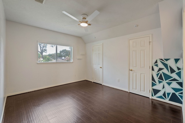 31335 Bearing Star Ln, Tomball, TX 77375 - unfurnished bedroom featuring dark wood-type flooring and ceiling fan