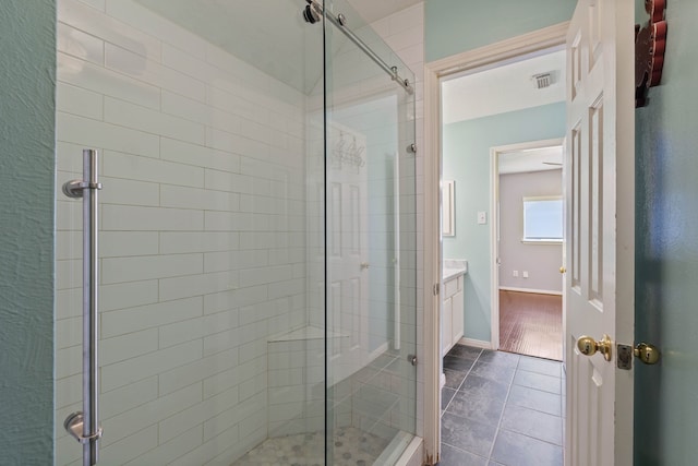 31335 Bearing Star Ln, Tomball, TX 77375 - full bath featuring a stall shower, tile patterned flooring, and vanity