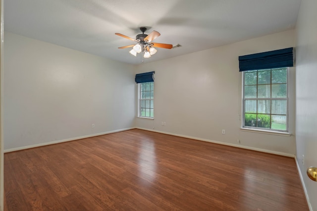 31335 Bearing Star Ln, Tomball, TX 77375 - unfurnished room featuring wood finished floors and ceiling fan