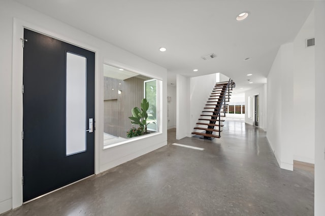 1518 Bayram Dr, Houston, TX 77055 - foyer with stairway, recessed lighting, and concrete floors