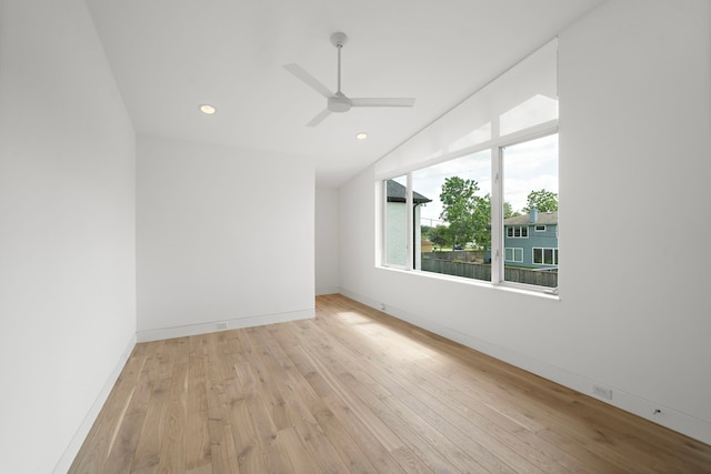 1518 Bayram Dr, Houston, TX 77055 - empty room with light wood-type flooring, lofted ceiling, ceiling fan, and recessed lighting