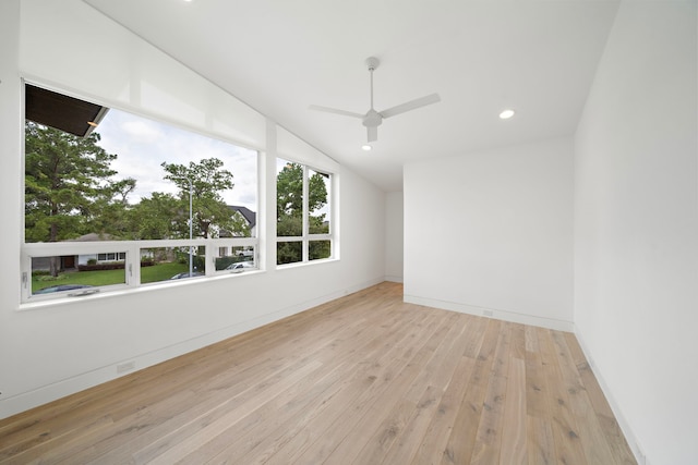 1518 Bayram Dr, Houston, TX 77055 - spare room featuring wood-type flooring, ceiling fan, vaulted ceiling, and recessed lighting