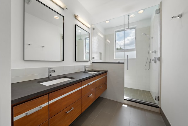 1518 Bayram Dr, Houston, TX 77055 - full bathroom with a stall shower, double vanity, tile patterned flooring, and recessed lighting