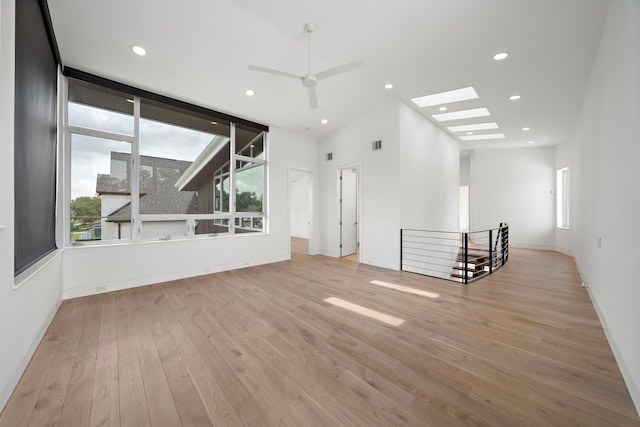 1518 Bayram Dr, Houston, TX 77055 - unfurnished room with healthy amount of natural light, hardwood / wood-style floors, recessed lighting, and a ceiling fan