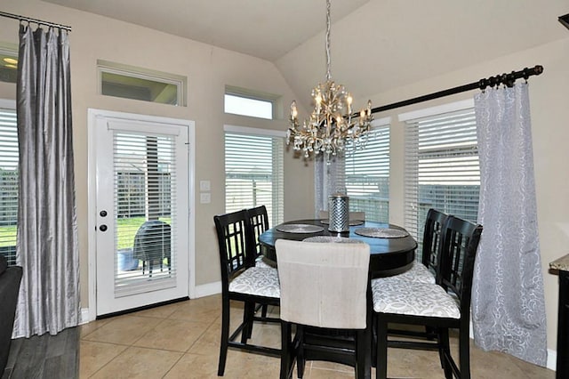22419 Slate Oaks Ln, Richmond, TX 77469 - dining room featuring a chandelier, vaulted ceiling, light tile patterned floors, and baseboards