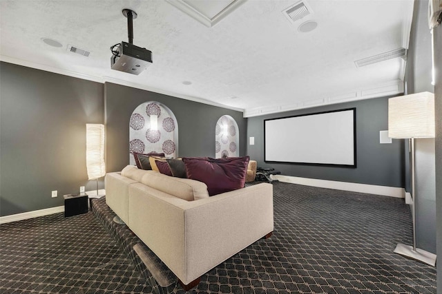 1215 Malone St, Houston, TX 77007 - carpeted home theater with baseboards, a textured ceiling, and crown molding