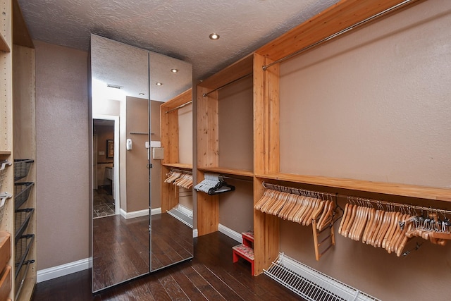 7103 Adobe Meadows Ct, Sugar Land, TX 77479 - walk in closet with hardwood / wood-style flooring
