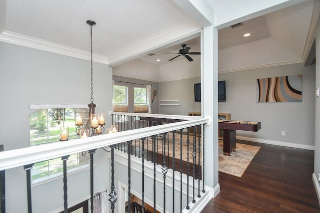 7103 Adobe Meadows Ct, Sugar Land, TX 77479 - hallway featuring wood finished floors, a chandelier, ornamental molding, baseboards, and an upstairs landing