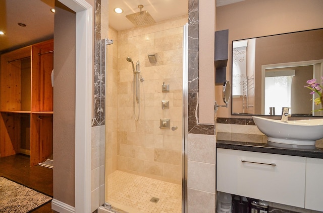 7103 Adobe Meadows Ct, Sugar Land, TX 77479 - bathroom featuring vanity, a stall shower, and recessed lighting