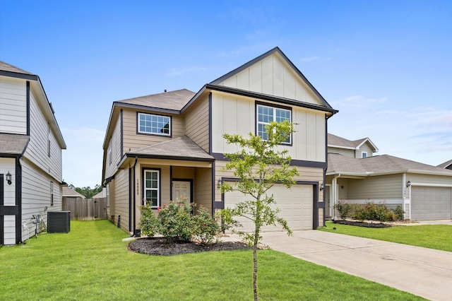 14008 Paddlefish Dr, Conroe, TX 77384 - view of front of home featuring board and batten siding, driveway, and a garage