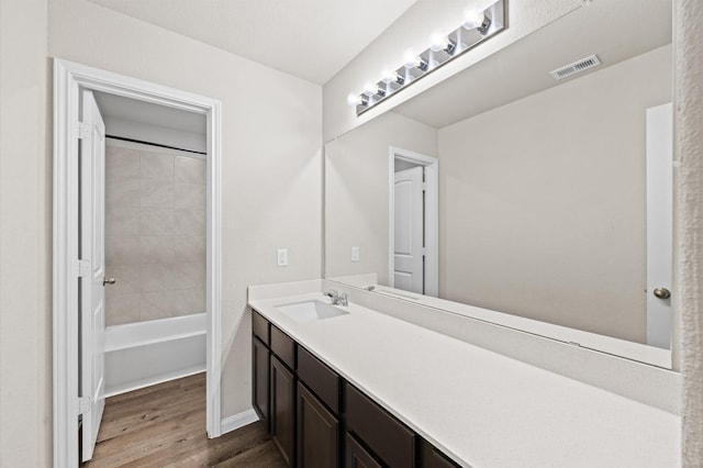 14008 Paddlefish Dr, Conroe, TX 77384 - bathroom featuring wood finished floors and vanity