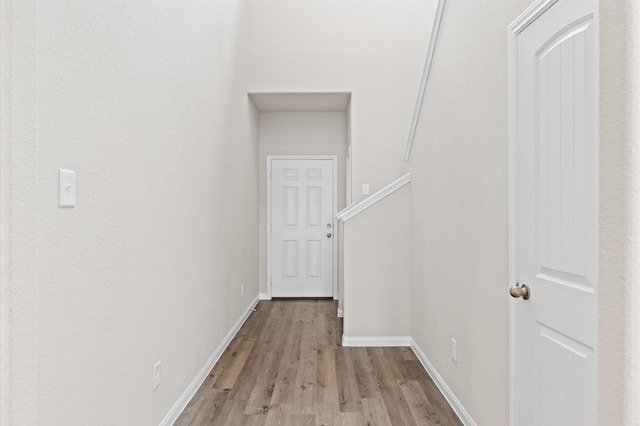 14008 Paddlefish Dr, Conroe, TX 77384 - corridor with wood finished floors and baseboards