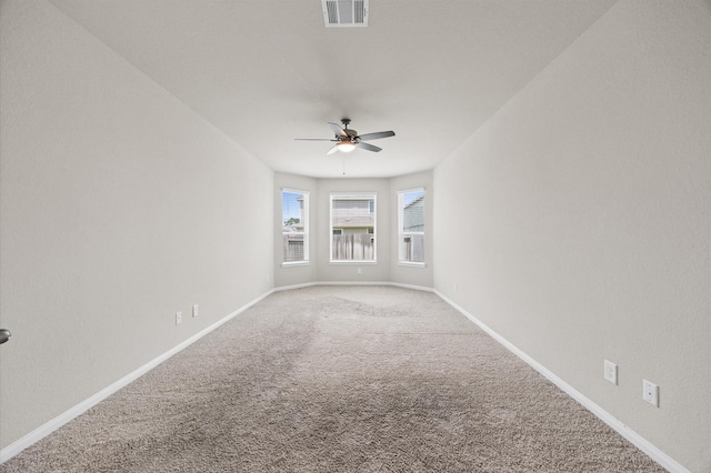 14008 Paddlefish Dr, Conroe, TX 77384 - carpeted empty room featuring a ceiling fan and baseboards