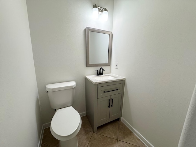 30611 Pinemill Hollow Dr, Spring, TX 77386 - bathroom featuring vanity, tile patterned floors, toilet, and baseboards