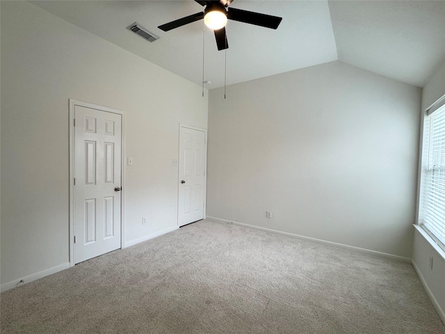 30611 Pinemill Hollow Dr, Spring, TX 77386 - unfurnished bedroom featuring light carpet, vaulted ceiling, baseboards, and ceiling fan
