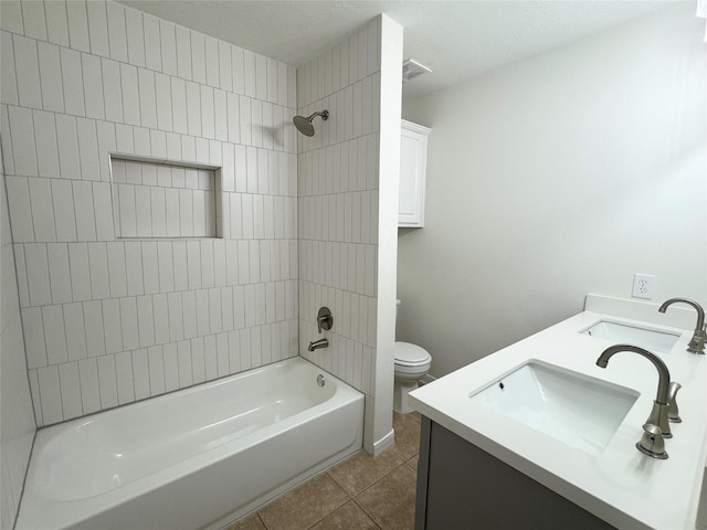 30611 Pinemill Hollow Dr, Spring, TX 77386 - full bathroom with tile patterned floors, shower / bathtub combination, double vanity, toilet, and baseboards