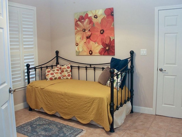2862 Dees Cir, Sealy, TX 77474 - tiled bedroom with baseboards