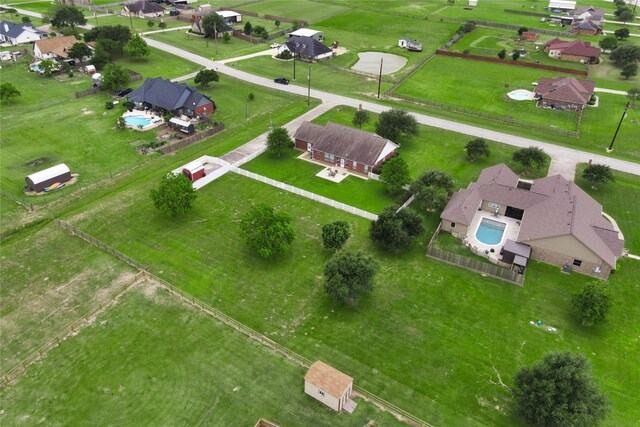2862 Dees Cir, Sealy, TX 77474 - drone / aerial view of a pool