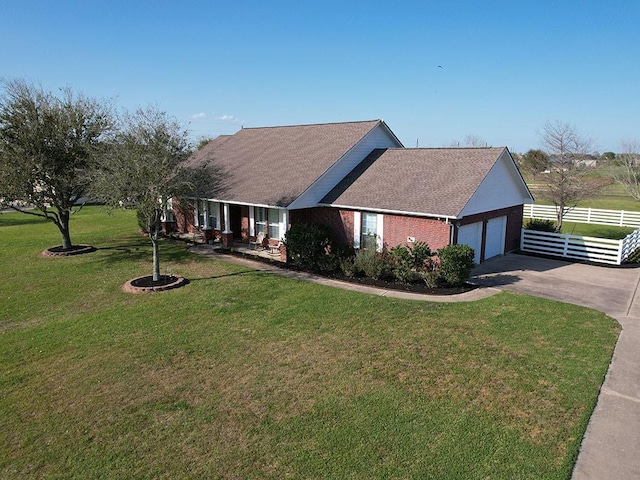 2862 Dees Cir, Sealy, TX 77474 - view of front of house with driveway, roof with shingles, and a garage