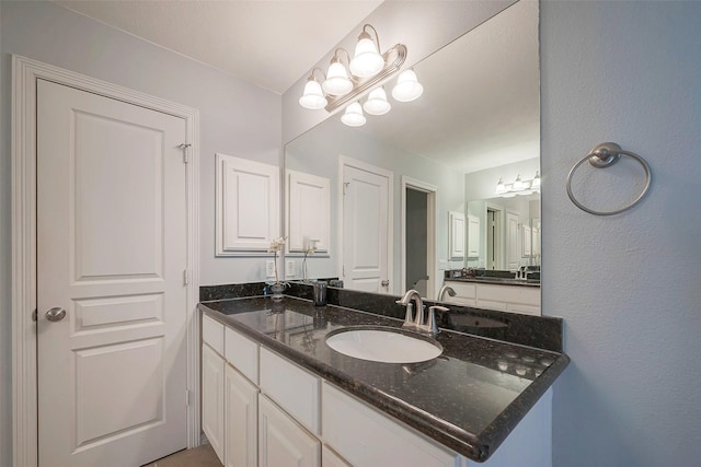 3426 Skyline Village Dr, Houston, TX 77057 - bathroom with a chandelier and vanity