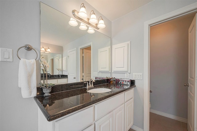 3426 Skyline Village Dr, Houston, TX 77057 - bathroom with vanity, tile patterned flooring, baseboards, and toilet