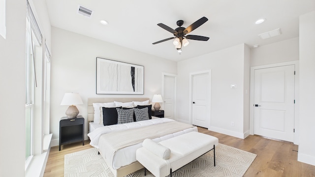 1813 Brooks St, Houston, TX 77026 - bedroom featuring light wood finished floors, baseboards, ceiling fan, and recessed lighting