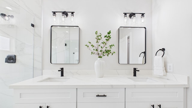 1813 Brooks St, Houston, TX 77026 - full bathroom featuring double vanity and a marble finish shower