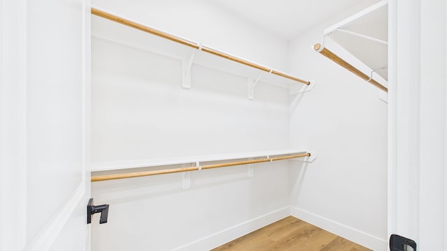 1813 Brooks St, Houston, TX 77026 - spacious closet with light wood-style floors