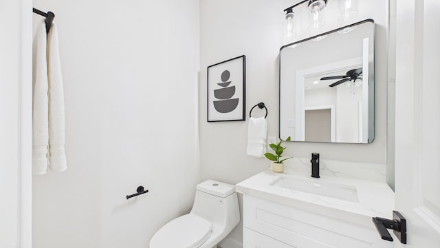 1813 Brooks St, Houston, TX 77026 - bathroom featuring vanity, toilet, and a ceiling fan