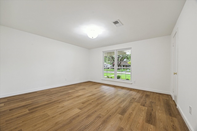 10715 Piping Rock Ln, Houston, TX 77042 - empty room with wood finished floors and baseboards