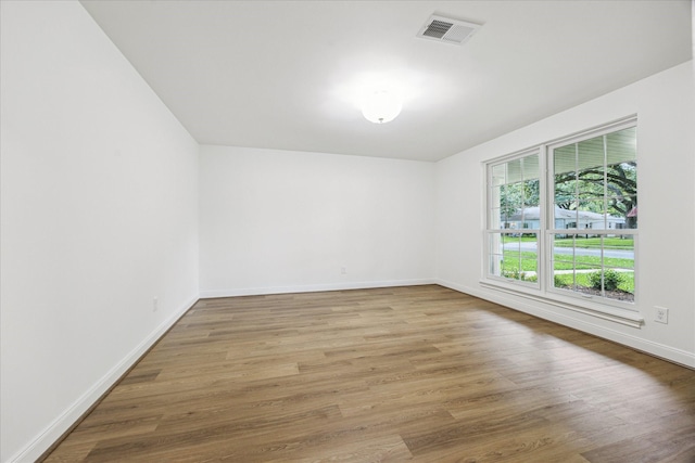 10715 Piping Rock Ln, Houston, TX 77042 - unfurnished room featuring light wood finished floors and baseboards