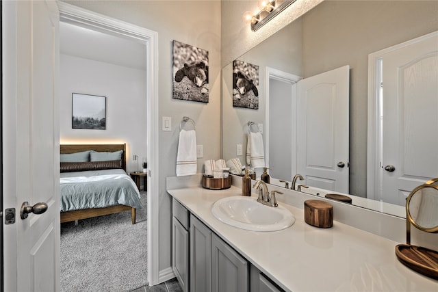 676 W Linnwood Dr, New Caney, TX 77357 - bathroom featuring ensuite bathroom and vanity