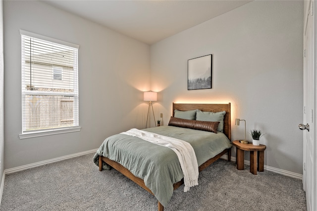 676 W Linnwood Dr, New Caney, TX 77357 - carpeted bedroom featuring baseboards